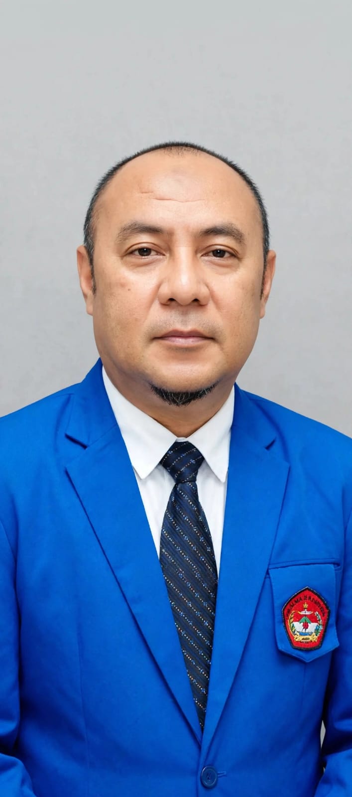Ichsan Milang, SE., MM